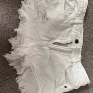 Distressed White Denim shorts
